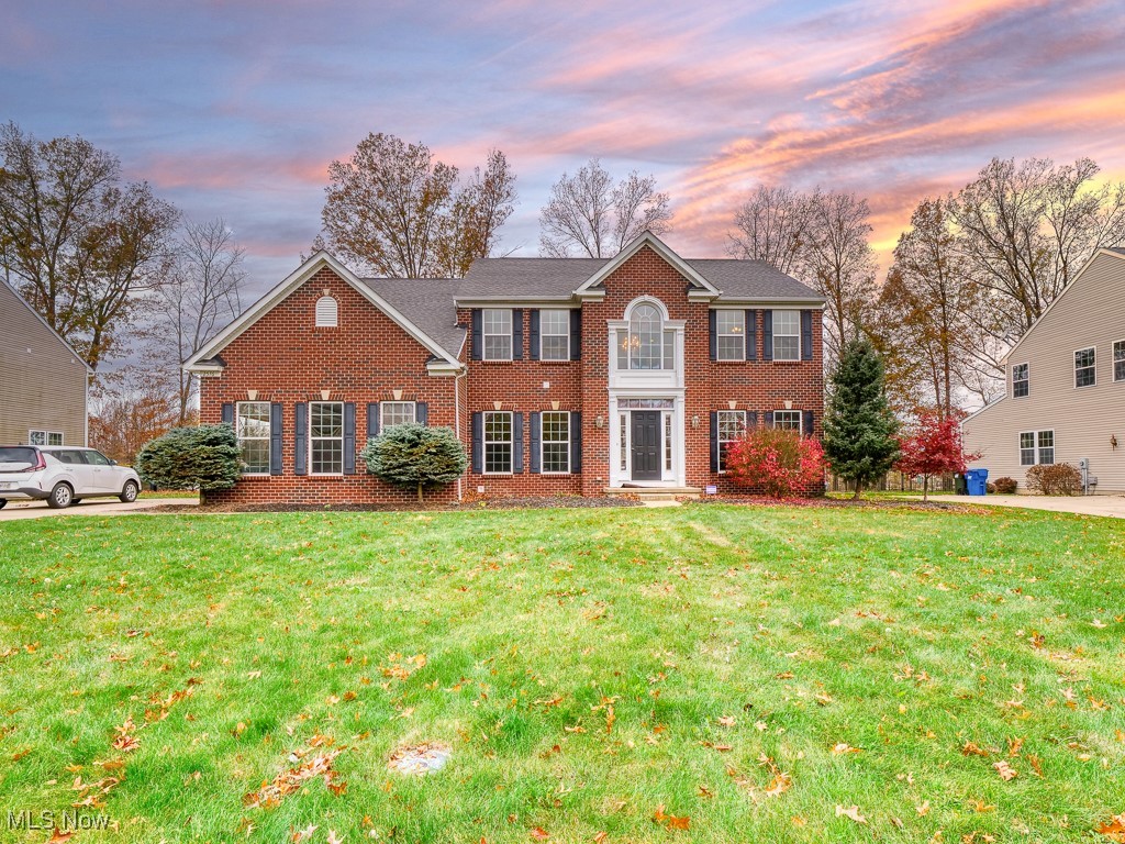 Welcome to 2576 Covington Pl., an elegant full-brick colonial nestled on a premium lot in one of Avon’s most desirable communities. Just steps from Avon Commons, this home offers unmatched convenience while situated in a quiet, family-friendly neighborhood— Location Location Location: This house is located less than 5 min off I-90, 2min to Avon Commons, Costco, and all shopping areas, 15 min to Crocker Park and 30 minutes to downtown Cleveland. The Avon School system is consistently ranked in the top ten in academics and athletics in Ohio. Step inside to discover an inviting, updated interior with brand-new carpeting throughout. The heart of the home is a stunning open-concept kitchen, equipped with beautiful granite countertops, modern appliances, and plenty of cabinet space. The kitchen flows seamlessly into a cozy family room complete with a gas fireplace, making it the ideal gathering spot for entertaining and everyday family moments. For those special occasions, enjoy the spacious formal dining room and an additional formal living room, offering plenty of room to host family and friends. A first-floor home office provides the convenience of remote work in a quiet, dedicated space. Upstairs, you’ll find four generously sized bedrooms and three bathrooms. The expansive primary suite is a private retreat, featuring a spa-like attached bathroom and a large walk-in closet. Each bedroom provides the space and comfort that growing families will appreciate. Outdoors, a private yard awaits, perfect for pets, children, or simply relaxing on warm Ohio days. The full basement offers endless potential—ready to be transformed into a playroom, media center, or extra living space as your needs evolve. This home truly shines in its combination of size, thoughtful layout, and second-to-none location. Don’t miss the chance to make 2576 Covington Pl. your forever home. Schedule a showing today!