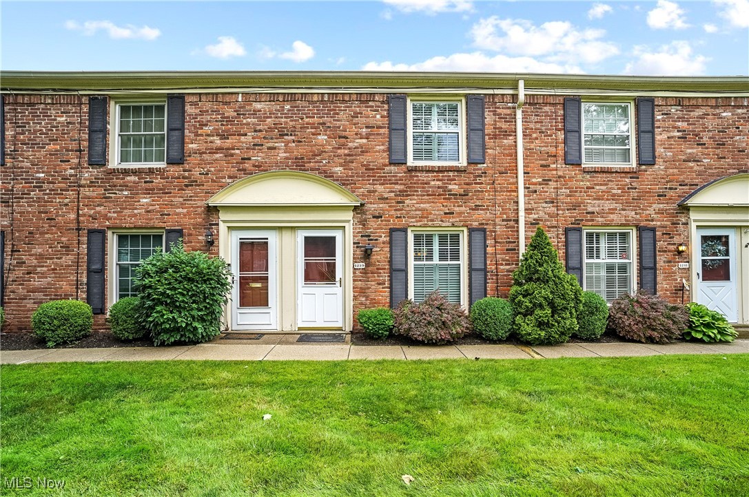 Adorable, updated 2-bedroom, 1-1/2 bath Condo with open floor plan and landscaped deck area. Large living room with engineered hardwood floors, eating area and kitchen with ceramic tile floor, kitchen with island, granite countertops, cherry cabinets, and stainless steel appliances that stay, including convection oven, fridge, dishwasher and microwave, and updated lighting. Also on first floor is a half bath with beadboard and brick walls, ceramic tile floor and pedestal sink, and also a coat closet with storage. At top of the stairs is a stack washer and dryer that stay, primary bedroom with double closet with sliding barn doors, second bedroom currently used as office/workout room. There's an updated full bathroom with step-in shower with glass doors and white subway tile, newer vanity with granite counter, and ceramic tile floor. Off the eating area are sliders that lead to covered deck and small brick patio, larger cement patio with landscaping and wood privacy fence. There's an extra storage closet off the patio, plus a second closet with furnace and hot water tank. Extras most of the condos don't have, built-in cabinet/pillar separating living room from dining area, linen closet outside the main bath, spigot for watering plants in the furnace closet and extensive landscaping with the covered deck. Updates include furn 2022, C/A 2017, carpet in bedrooms & stairs 2021, engineered hardwood in living room 2021, main bathroom 2021 including shower/vanity/toilet/floor/subway tile, kitchen appliances 2024, electric box 2020 with surge protection, new interior Alder wood doors and closet barn doors 2021 (left unstained, in natural state), unit repainted within past 2 years, all newer windows, plantation shutters. Home warranty included. There are two walkways from parking lot and assigned spot to front and back entrances, plus several visitor spots. Nothing for you to do but move in and enjoy the assoc. pool and tennis/pickleball courts. Make your appointment today!