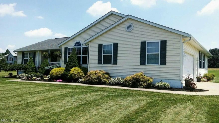 First floor living at it's finest. Open, airy floor plan. Extra large open living area. New light fixtures throughout. Updated kitchen features new countertops, back splash and laminate flooring. Plenty of sunlight in eat-in-kitchen, also has breakfast bar and desk space. Stainless steel appliances. Master suite features jetted tub, tiled stand up shower, his/her double sink and huge walk-in closet. First floor laundry room with extra storage space. Partially finished basement provides additional 1,000 sq. ft. of living space, 8 ft. ceilings, unlimited potential in basement, also walks out to backyard. 2 car attached garage. Beautiful 3.6 acre lot. Don't wait, call today!