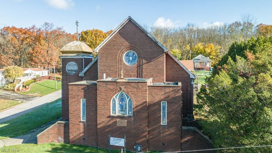 All Brick House of Worship located on a quiet, low traffic street in Struthers. Interior features 2 Offices on Main Level, Stained Glass Windows, Powder Rm, Balcony/Loft area, and so much more.  Seller including several interior items from the church, to many to list. Lower Level boasts a Full Bath, Powder Rm, Full Kitchen and Gathering/Dining or Flex Space Area. Plus 2 additional rooms perfect for Office Space or Storage. This property is zoned RA by Struthers Zoning. Perfect spot for a House of Worship, School, or Day Care. 2 Forced Air Gas Furnace apprx 2002.  2 A/C units newer as well, age unknown.