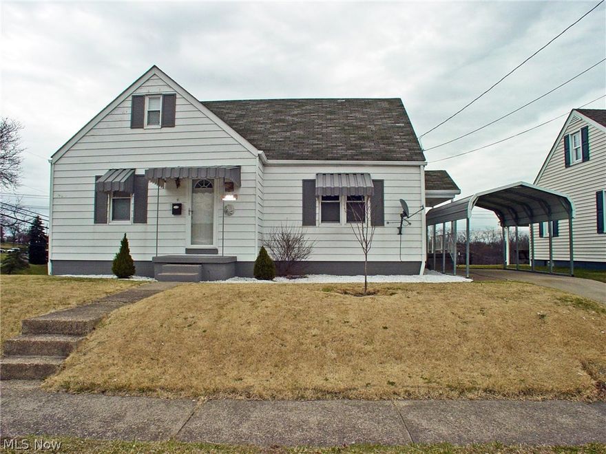 A must see! This 3 bedroom, 1.5 bath Cape Cod home sits on a well manicured lot.  You'll love the newly remodeled kitchen with maple cabinets, granite countertops and gleaming hardwood floors. Home Warranty included!  Call today!