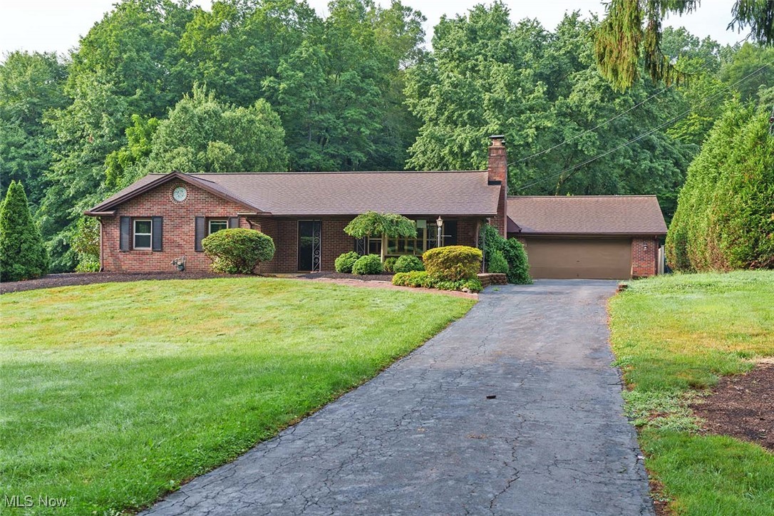Look no further, this updated 3-bedroom, 2-bathroom brick ranch home with an attached oversized 2-car garage sitting on 1.5 acres in the Massillon City School District is now available and looking for a new owner. This beautiful and well-maintained home is just what you have been looking for. It is move-in ready! The main level has a living room with a gas fireplace, an updated eat-in kitchen, 3 bedrooms, an updated full bathroom, and a large 4-season room with a fireplace. The lower level is partially finished with a recreation room with a fireplace, the 2nd full bathroom, an office, or 4th bedroom, and lots of storage. This home is located in a country-like setting yet close to schools, shopping, dining, and more. Don't sleep on this gorgeous property. Call today to set up your private showing.