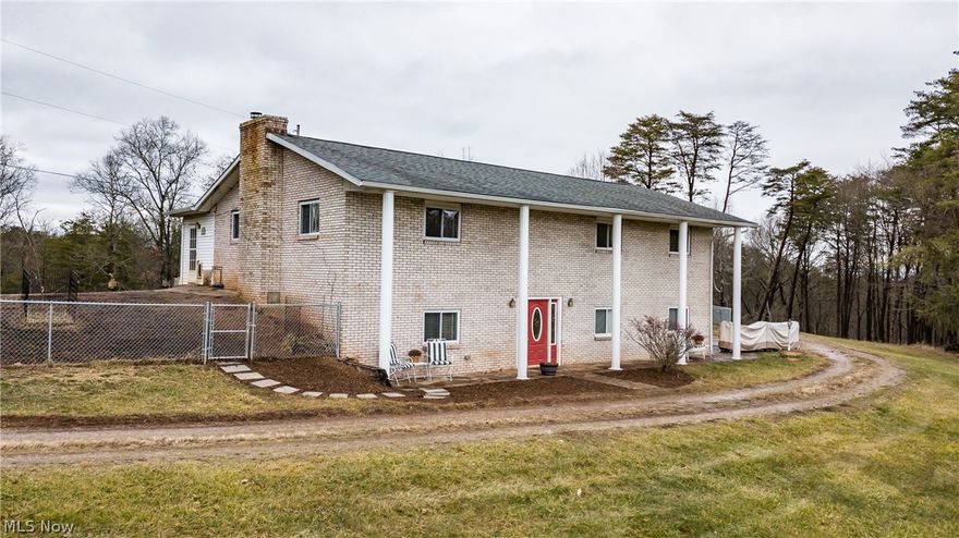 The beautifully maintained home sits on 5 acres and is back off the main road for your privacy. New carpet and neutral beige paint throughout the home in the past month.  There are two fireplaces in the home, the one upstairs is electric and the one downstairs is wood for added heat sources. The top level has nice sized bedrooms and a 20x15 living room for entertaining. On the bottom level is a spacious family room along with a bath, utility room and storage room that could be used as a 4th bedroom. On the back of the home is an enclosed porch and the back yard has a chain link fence to keep your furry friends safe. Enjoy the 40 x 20 pole barn with 3 garage stalls and a woodworking workshop on the 2nd floor in which all woodworking equipment conveys with the property. Homeowner had property surveyed by Charles Hughes 4/2020 and will be provided to potential buyers. This home is priced to sell and won't last long!  Call for your private showing today!