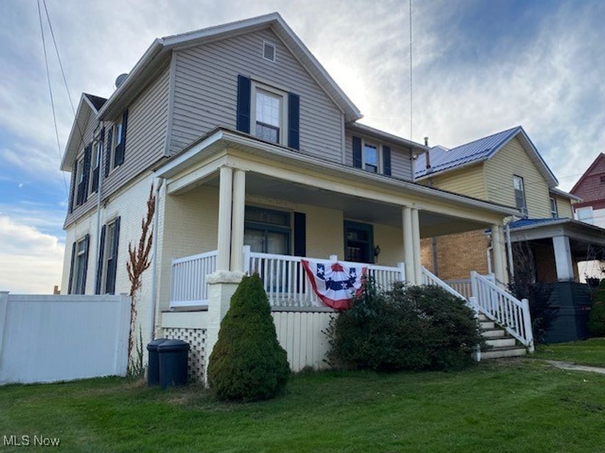 This spacious three-bedroom home is located on desirable, historic Main St and offers the perfect blend of classic character and modern comfort. A large front porch welcomes you, ideal for relaxing or greeting neighbors.  Inside, you'll find a generous living room and formal dining area, perfect for entertaining or family gatherings.  The home also features a walk-out deck, providing seamless indoor-outdoor living.  With its inviting layout and prime location, this property is a rare opportunity to own a piece of Main Street charm.