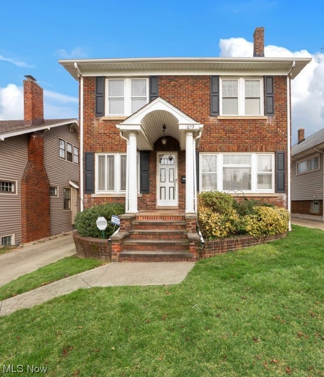Welcome Home to this classic brick colonial located on a desirable, owner occupied street in Lakewood! Most of the windows have been replaced over the past 10 years. Boiler system replaced 2021. This home is full of character & charm! Hardwood floors throughout! 1st floor office or sun room with beautiful french windows! The living room has lovely, leaded glass windows + a fireplace w/a wood burning stove that can heat up the whole house. Dining room is open to the kitchen & living room and features a classic built-in cabinet. The kitchen was tastefully updated w/quality KraftMaid cabinetry, tile flooring, tile backsplash, hard-wired under cabinet lights & is fully equipped w/all appliances (microwave 2023) A den/family room off the kitchen offers an additional room on the 1st floor. The 2nd floor has a well designed, large updated bathroom w/tile flooring, tile shower & bathtub, nice vanity & large built-in cabinet. You will love the master bedroom w/built-in electric fireplace that can also create heat + 3 large closets with built-ins: a rare find in Lakewood! The storage space in this home is just amazing!! 2 additional bedrooms, additional hallway storage & access to 2nd floor deck complete the 2nd floor. Large 4th bedroom on 3rd floor with brand new carpet, a walk-in closet + additional attic storage. The basement has a workshop, an old school finished rec room w/ decorative fireplace, a 2nd full bath w/brand new vanity & the utility/laundry room. Outside you have a nice size, private back yard, & the 2+ car garage built in 2002 w/loft storage & motion sensor lights. Lovely street - no multi-families here! Walking distance to Madison Park, & many of the great restaurants/shops/bars on Madison Ave. Electrical panel was updated. Roof age unknown, but last time it was replaced it was a complete tear off. Well maintained by same owner since 1978. Truly a great value in Lakewood! See virtual 3D tour & schedule your private tour today! Sold AS IS.