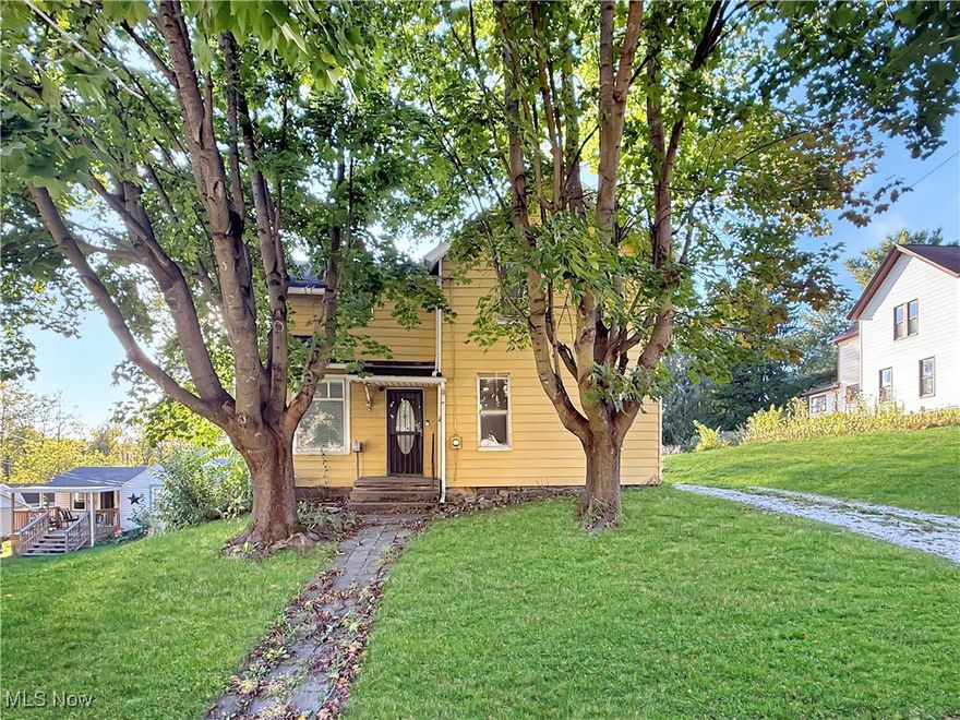 If you are looking for a unique home in Mogadore build in 1873, with many updates, this is a very nice home.   Large kitchen area opens up to the dining room and the family room.    Three nice size bedrooms upstairs.  The backyard offers a tremendous amount of space for games, functions....etc!  Don't miss this opportunity to own a 3 bedroom home in Mogadore.