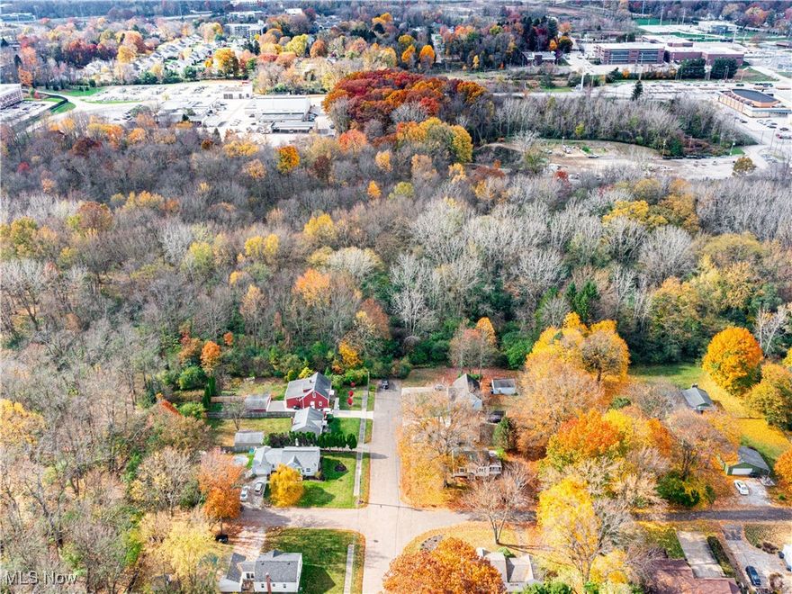 Unique opportunity to own appox. 12.5 residential acres in West Akron. At the end of quiet Idlewood Ave. & Alden Aves., this large piece of vacant residential land gently rolls and has a small creek that runs through it in a 'C' shape. Public utilities available. There are 4 sewer manholes on the eastern property line from which to likely tie into city sewer. Gas well on property, current royalty is around $780/yr will pass to new owner. Close to shopping, dining, highways. Heavily wooded privacy awaits!