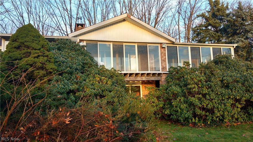 A fantastic family home in the country awaits the owner of this spacious ranch home in Thompson. This home and its nearly 32 acres will make your imagination wander as you come up the winding driveway and look to the left to find a large lake and yard for your family to fish, play and explore upon. Once inside the home you will notice the open floor concept and the double fireplaces that can be enjoyed from kitchen or living room. The master bedroom is very large with its own full bath and great closet space. The entire east side of the home has a patio enclosure with slider doors that overlook the lake and allow the new owners and guest to enjoy amazing views and make lasting memories. The home offers a spacious kitchen and two more bedrooms and a second full bath on the main floor. The basement/workshop offer another possible bedroom or family room that gives owner another full bath and walk out with slider doors and yes another fireplace! This home will need some updating and we are