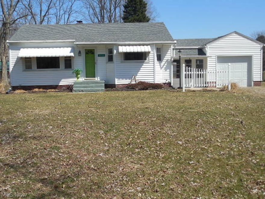 This is a sweet one floor plan home with river frontage just minutes from town on 1.56 acre. This doll house has 2 bedrooms , full bath, breezeway leading to an attached garage. There is a full finished basement. there is a large detached garage with a full bath and offers many possibilities.