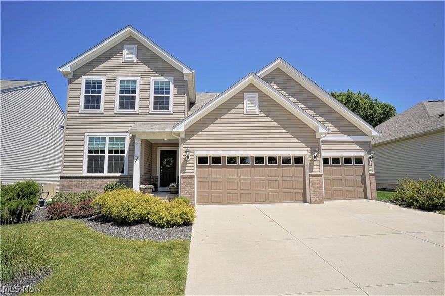 Wonderful opportunity to own this beautiful home that has been meticulously maintained. Located in Hudson Schools & convenient to RT 8 Seasons Rd exit/entrance. The foyer welcomes you w/hardwood laminate floors & extensive trim work including wainscoting & crown molding. The wood floors extend throughout the first floor into the open kitchen, which features upgraded espresso maple cabinets w/granite countertops, stainless steel appliances & a spacious island perfect for entertaining. The large kitchen café opens to the great room that offers a 4' extension for added space & a gas fireplace.  There is a first-floor laundry room, spacious mudroom w/built-in convenience bench, mail center/computer area & dedicated home office. The full basement has been professionally finished w/2 egress windows, 9' ceilings, a fabulous family room w/ship lap wall & built ins w/granite countertop, a bedroom & a phenomenal full bath w/shower & gorgeous soaking tub. To top off the finished basement there is