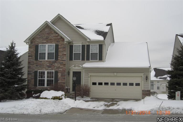 Beautiful 3 bedroom cluster home in Revere School District. Very open floor plan & lots of wood floors on first floor. 1st floor laundry room, kitchen has an island. Master bedroom has vaulted ceiling. Master bath has a tub & shower stall, double sink. Walk-in closet. 2 other bedrooms are good size with ample closet space. Family room leads to the deck. The deck is newly painted. $5,000 allowance towards carpeting/painting. Walkout basement. Low maintenance. Easy to show.