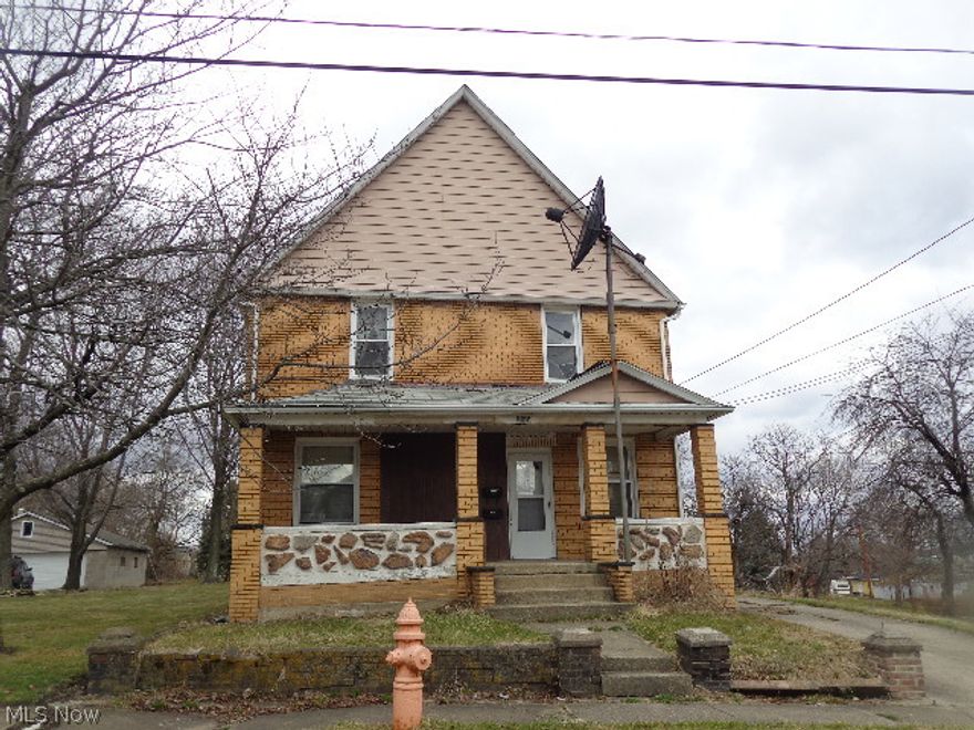 2 Story Brick Duplex one unit up and one down. 2 car detached garage. Property sold as is. No guarantess. No warranties. Must be pre-approved or show proof of funds.