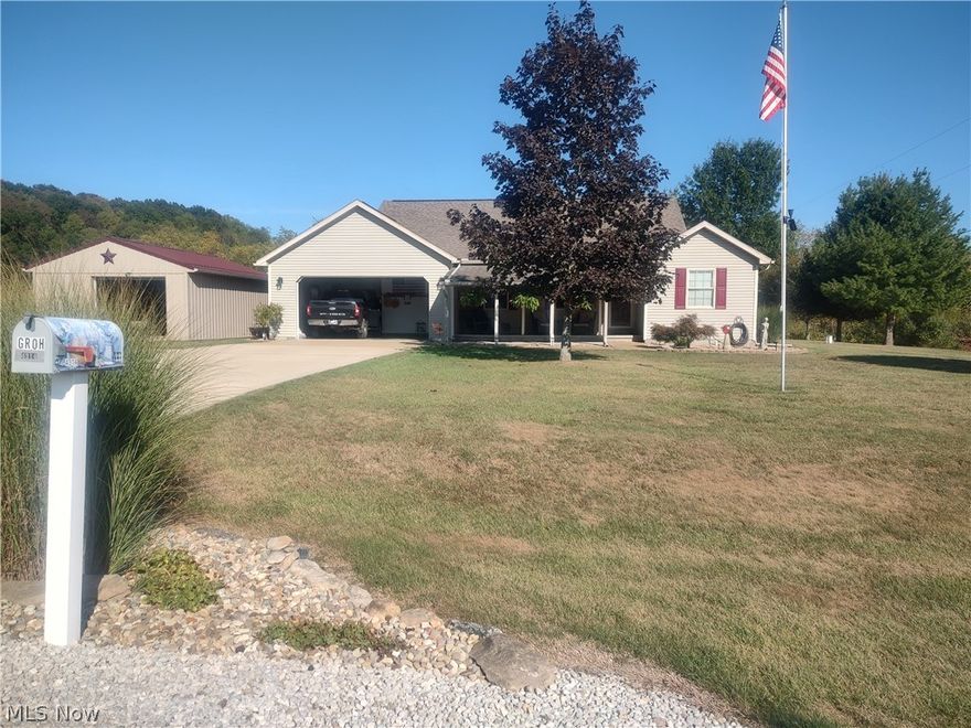 Charming Ranch-Style Home. A Fisherman's Dream Home! Move-in ready ranch offering one floor living w/ abundant extras & updates. Located minutes from Atwood Lake & just 15 minutes to shopping and nearby towns. 3 full bedrooms on main level, Jack-and-Jill bedrooms w/ a spacious full bath between two bedrooms. Primary suite w/ large full bathroom & huge walk-in closet. Main-floor office and convenient half bath. 20x20 Living room with gas fireplace and access to the back patio.  Beautiful large kitchen w/ pantry, casual dining area, plus formal dining room adjacent .First-floor laundry w/ built-in shelving & cabinet. Walkout basement w/ possible 4th bedroom, full bath features a shower new in 2018, and kitchen area — ideal in-law suite or rental. Wood burner, newer furnace, & two generator systems. 2 car attached garage featuring an area w/ seasonal/plant storage, plus an additional detached garage. Detached Barn/Shed. Covered patio & a back patio. Newer attractive Smart core premium waterproof flooring thorough & many updated amenities throughout. 3 Types of heat, electric, wood burner, and propane. There is a pond is on the adjacent lot that can be used by families in the allotment. Shared Space not owned by seller.  Lots of beautiful perennials and a space for a garden. Some portions of the back yard are fenced.  Newer Furnace and air in 2017. Public water and  sewer.