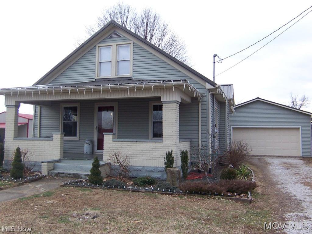 Pretty curb appeal best describes this house nestled on a huge corner lot with a 40x24, 3 stall garage. House has newer windows, siding, and a metal roof. Dry basement. Out of city limits. Elem: Belpre Elementary School Elem/Bus: Y JrHigh: Belpre Middle School JrHigh/Bus: Y High: Belpre High School High/Bus: Y Fire: VOL Police: SHF ;SQFT=Fin L1:932, Fin L2:352, Fin Bsmt:377, Fin Above:1284, Fin Total:1661, Unfin Bsmt:541, Unfin Above:541;GAR= 3 Car Det