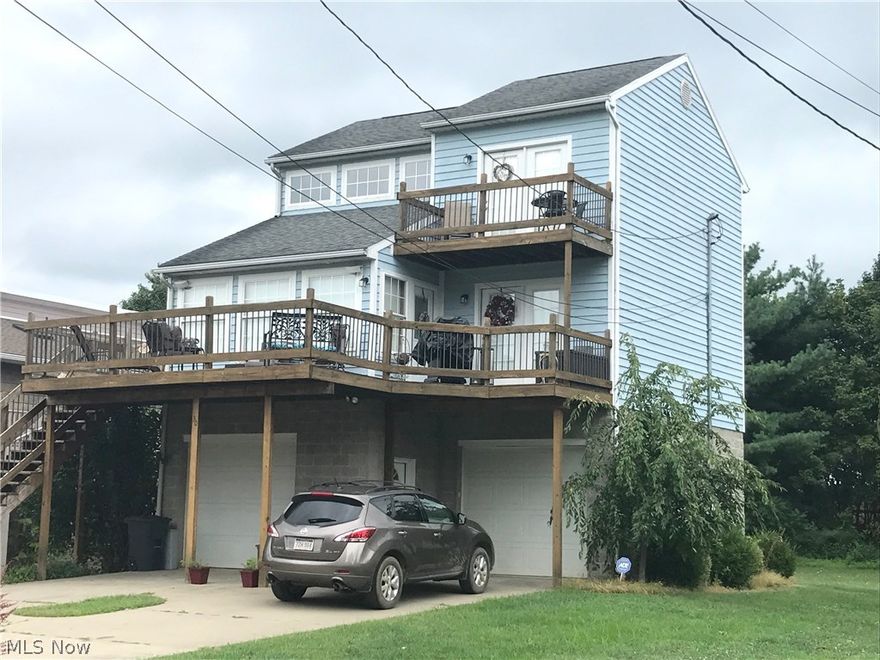 Very nice home on a private street with river view & access. Beautiful views from the decks looking at the Ohio River. Updated kitchen & baths. 2nd parcel is river front for use of a boat dock.