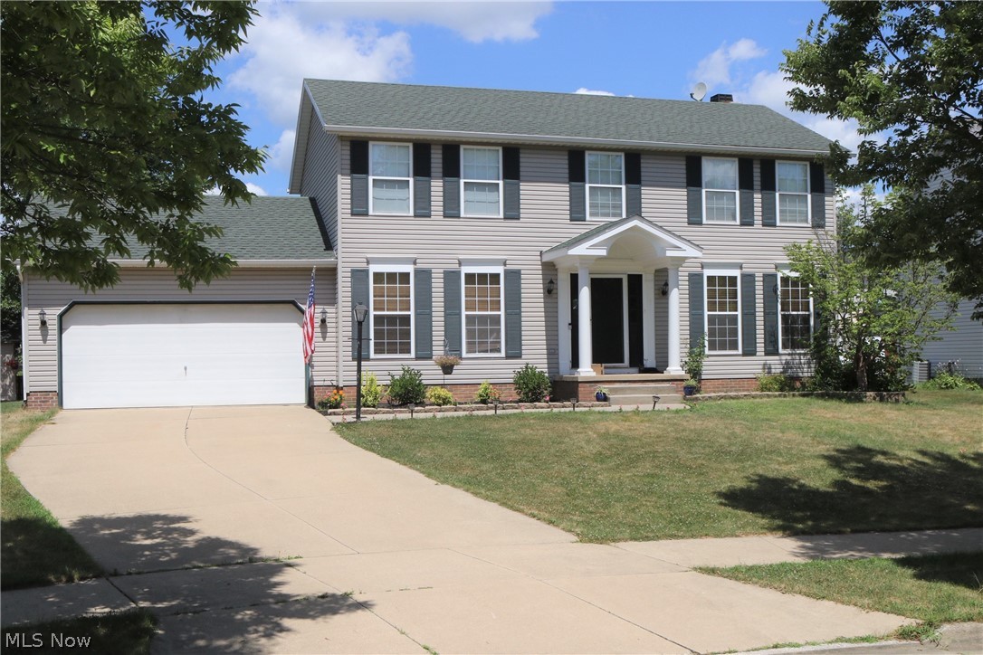 Welcome to 575 Colchester Court, a beautiful 4-bedroom, 3 bathroom Colonial home in Akron (Coventry Local School District). Step inside the front door to be greeted with a lovely foyer with hardwood floors. The first floor is made up with a living room, eat-in kitchen, dining room, bonus room, and half bathroom. Sliding glass doors off the kitchen lead to the back patio. French doors lead from the living room to the bonus room, a perfect spot to have a play room, office… the options are endless! The dining room offers a formal area to have dinner. The windows on the front of the house are extra large, making the home very bright with natural light. The Owner’s Suite has a walk-in closet as well as a large bathroom with double sinks, a vanity area, and sky lights. Three additional bedrooms and a full bathroom are located upstairs. Don’t miss your chance to own this lovely home! Schedule your showing today!