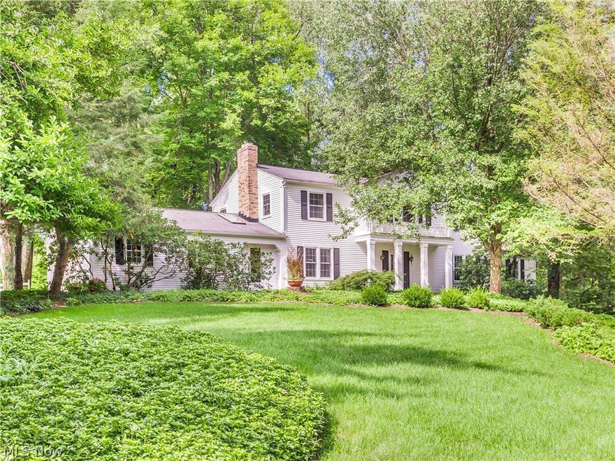 This charming classic Colonial is located in the highly desirable Bath community and is situated on 1.25 acres. Lovely setting with mature landscaping and trees, brick patios and paths to stroll through the woods, a Gazebo and plenty of green grassy lawn to enjoy. Lovingly maintained for over 50 years by the current owners who continually expanded and improved the floor plan  bringing the current total sq ft of living to 3264. Foyer entry steps into the expansive  formal living room which has two sets of sliders, one leading to the new deck porch and one leading to the sun room. This living area is also open to the formal dining room with sliders to the park like backyard. Cheerful kitchen with quality retro cabinets, a built in desk, breakfast bar, updated appliances and a very spacious separate dining area. Cozy family room with a gas or wood burning fireplace. A mud room and 1/2 bath complete the first floor. Many rooms have  hardwood floors throughout and skylights to brighten the