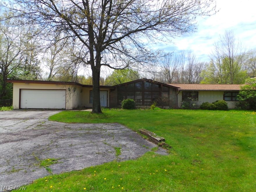 This Lovely Home Needs Some Work But Has Unlimited Potential.  4 Car Tandem Garage*Storage Galore*Open Floor Plan W/Cathedral Ceilings*FP and much more!  Property sold AS IS.