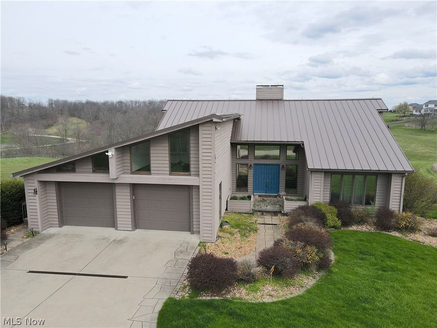 Immerse yourself in tranquility at this expansive 4-bedroom, 3-bathroom residence situated on a sprawling 6.98-acre lot in Belmont, Ohio. Constructed in 1998, the property boasts over 3,800 square feet of living space, ideal for families or those seeking a haven with ample room to roam. Step inside and discover a world of possibility – picture relaxing evenings curled up by the fireplace or hosting joyous gatherings in the generously sized rooms.

Beyond the inviting walls, nature enthusiasts will find themselves spoilt for choice. The close proximity to Barkcamp State Park beckons with opportunities for outdoor adventures. Hike along scenic trails, explore hidden coves on the lake, or simply bask in the serenity of the natural surroundings. This residence presents a unique opportunity to combine a comfortable and spacious home with the tranquility of a nature lover's paradise.