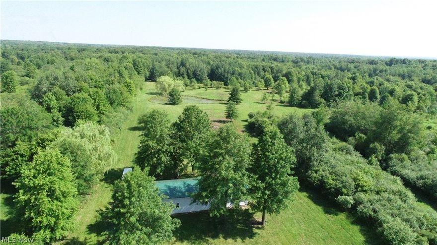 Almost 19 acres with a pond, electricity, 24x50 building(potential to be turned into a home?) with a 24x24 add-on structure that is great for storage of your machinery and toys. Drilled water well provides running water to large building. The building sits well back off the road.  There is a good solid driveway all the way back to the building and a good parking pad behind the building.  The land is a mixture of fields and woods.  There are paths cut around the perimeter of the property to make it easy to navigate. Abundance of deer and signs of turkey.  447' of road frontage and 1860' deep. This property is the perfect getaway, hunting spot, or bug out destination for when city living drives you crazy. You can have a blast riding your ATVs or sit by the pond and enjoy the peace and tranquility.  Great site to build a new home.  There is a scarcity of nice parcels of land like this with all so many amenities in place for you to just come out and start enjoying. It should not last long