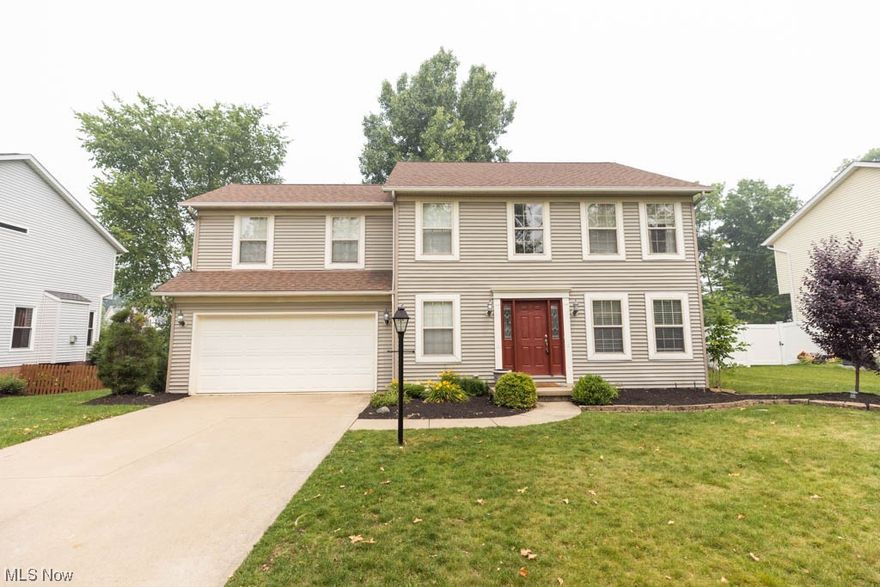 Welcome to this charming single-family colonial home that boasts comfort, style, and ample space for all your needs. Situated in a serene neighborhood, this property offers 3 bedrooms, 2 full baths and 1 half bath. The spacious living room is bathed in natural light, thanks to large windows that offer picturesque views of the surrounding greenery. Off of the living room, through the double doors, is a bonus room that would make a perfect office. The open floor plan leads the living room to the kitchen. The kitchen has plenty of counter and cabinet space, a large pantry, and room for a dining table. Off of the kitchen is the formal dining room, perfect for entertaining. The sliding door off of the kitchen leads to a large deck overlooking the fenced in backyard. In the backyard there is a stamped concrete patio as well. Head upstairs to the large Master Bedroom complete with a walk-in closet and ensuite. The other 2 bedrooms are large and have spacious closets. Down in the basement ther