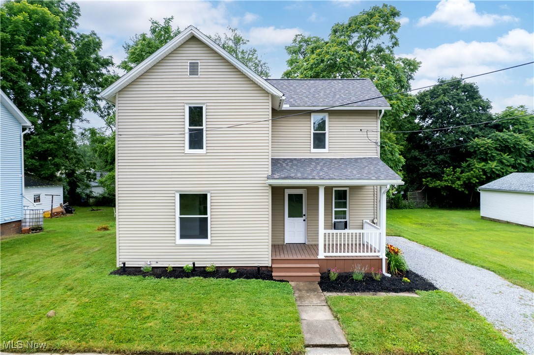 This charming home has been recently renovated, offering a fresh and modern feel while keeping its cozy character. Step inside to find a bright and open layout featuring all-new flooring, a beautifully updated kitchen with ceramic tile, brand-new cabinets, and stainless-steel appliances. The spacious first-floor bathroom has been tastefully updated, and there’s an additional half bath upstairs for added convenience. Upstairs you'll find three comfortable bedrooms plus a flexible bonus room, perfect for a fourth bedroom, home office, or playroom. The first-floor laundry makes daily routines a breeze, and new central heating system. Enjoy peace of mind with all-new windows and a new roof. Relax on the inviting front porch or enjoy the nice sized backyard, ideal for outdoor activities or gardening. This move-in ready home is waiting for you to make it your own!