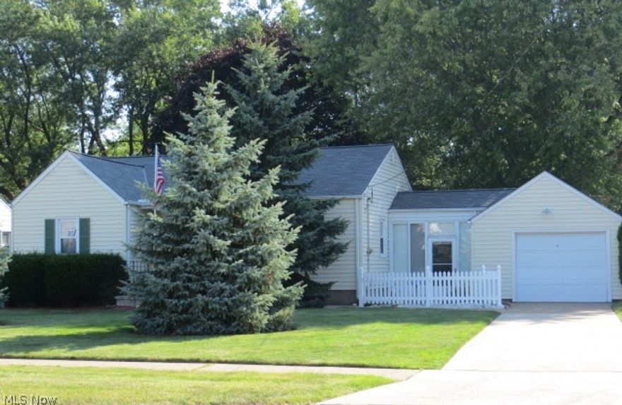 Looking for a smaller home but don't want a condo?  This home has hardwood floors throughout with natural woodwork.  Replacement windows, updated kitchen, partially finished basement  (bar & sink) and breezeway attached to the garage. Extra parcel included for a backyard garden and private yard adjacent to a flagpole lot. Great location short distance to the Lake Erie/Miller Road Park/Boat Ramp and shopping.  Features include all appliances (no dryer),  battery back-up on the sump pump, basement waterproofed and steel support beams installed years ago.