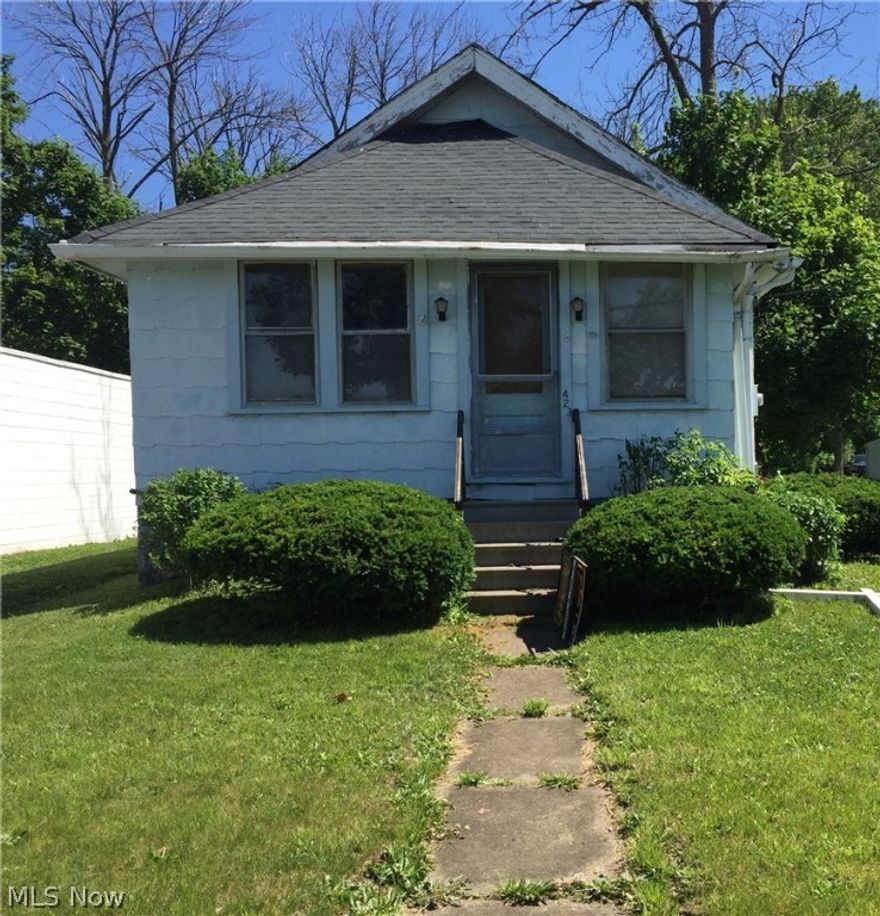 Lovely two bedroom home features front enclosed porch and back porch.  Home being sold with refrigerator, stove, and washer.  Home equipped with security system. Tremendous view overlooking Black River Landing where you can watch the fireworks, concerts, and festivals from your front yard.  Within walking distance to Lake Erie. Point of Sale inspection already completed. Seller making point of sale repairs.