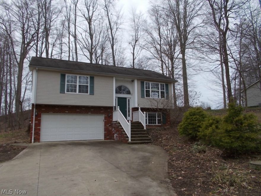 Newer Custom Home*Cathedral Ceilings,Hardwood Floors,Open Floor Plan W/Large Rooms & Walk-in Closets*Master Suite W/French Doors To Huge Covered Deck *Wonderful Private Setting*Conveniently Located Near 422*Owner Occ. Buyers & Agents must sign OwnerOccupant Certificate found in MLS Attachment in order to make offer.  This is a Fannie Mae HomePath property. Purchase this property for as little as 5% down!