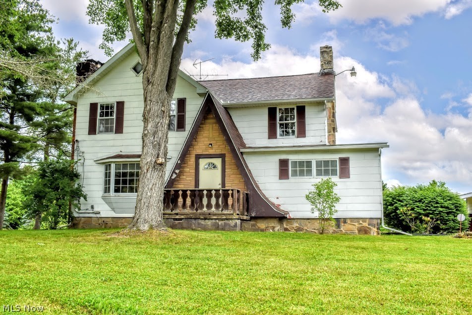 Welcome Home! This big beautiful century home is waiting for you! Built solid in 1860 with additions & updates in 1978. On the main floor you will find a large eat in kitchen, dining room with a fireplace, office, and a living room with another fireplace. You will also find a large master suite (or in-law suite) with full bath & first floor laundry. The second floor has a full bath & 4 big bedrooms with ample closet space in each, and the largest bedroom even has its own fireplace! The semi finished side of the basement has a full bath, separate breaker box, gas hook up & its own entryway to the driveway. The furnace, central air unit, water filtration system & roof on house & garage all replaced within the past 13 years and a new hot water tank in 2020. Now step outside to a picturesque view! 42 Acres with a creek, 2 fully stocked ponds with bass & blue gill and surrounded by woods, great for hunting. Have your morning coffee on the porch and watch the deer roam free in your back yard