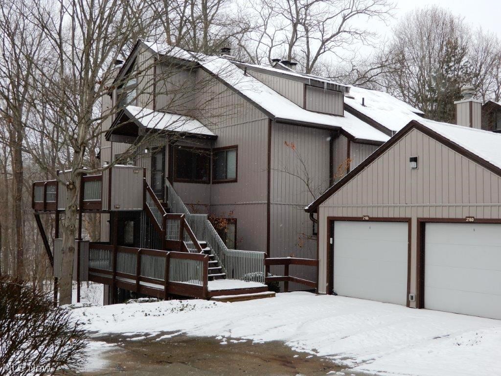 Desirable end unit condo in the Pine Ridge Mills development. Gorgeous wooded views, 2 spacious bedrooms and 2 full baths. Lower level features stone fireplace, family/rec room, and walk out patio.