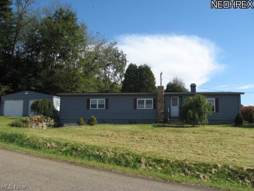 Case #412-613228: HUD Homes are sold AS-IS. Ask agent for details and instructions to place a bid. This 3 bedroom, 1 bath Split level home needs updated. With a little elbow grease this home will perfect for someone wanting to live out in the country. Nice built in china cabinet in the dining room and beautiful stone fireplace in the living room. In the basement, there is a finished family room with a wood burner stove and bar. There is a 1 car attached garage plus a 2 car detached garage. All of this sets on 3/4 of an acre.