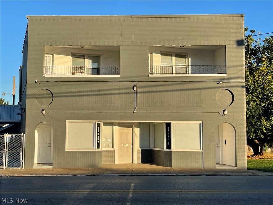 This unique property has many possibilities and will WOW you with the updates and possibilities!  This multi-use property has a blank slate retail space at the main level that includes washer/dryer hookup, a half bath, 3 bay attached garage with 10ft garage doors, a front and side entrance.  The top level has two apartments with separate lower level entrances.  Currently there is a door that opens between both apartments but could be easily closed off to separate the apartments.  The first apartment offers a large one bedroom with balcony access, an updated bathroom and an open concept updated living room, dining room and kitchen with fridge, dishwasher and stove. The second apartment offers two bedrooms, an updated bathroom, kitchen with fridge, dishwasher and stove and a living room with space for dining and access to the balcony.  Many updates throughout the property include electric, tankless water heater, lower level HVAC system, security system and chain link remote door fence.