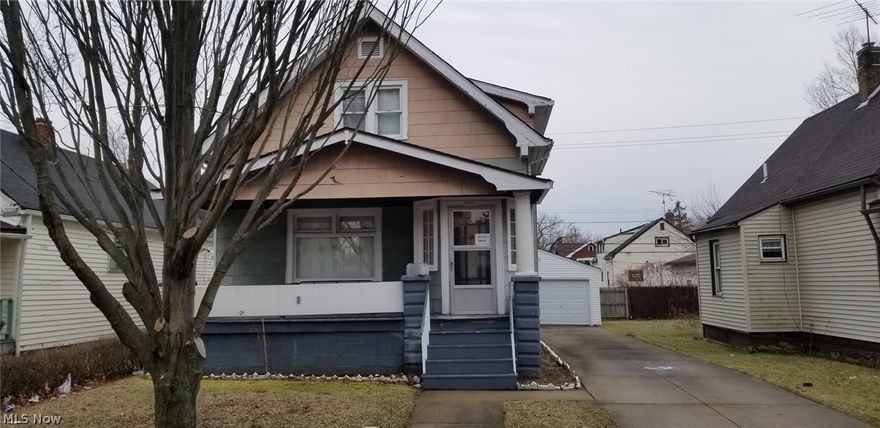 This well maintained, spacious 4 bedroom, 1.5 bath home is ready to move into! Featuring hardwood floors, built-in bookshelves and shelving, tons of closet space, and a full basement. The formal dining room separates the big living room from the kitchen - complete with new counter, kitchen sink, and flooring. The entire home is freshly painted and has brand new carpet in the master bedroom. Outside, there is a newer garage with a partially fenced yard, balcony, patio, and front porch. 1 bedroom and full bath downstairs, 3 bedrooms and half bath upstairs. Laundry hook ups in basement. Fridge and stove included. Inquire today to make this house your home! Please no pets, no Section 8. Tenant pays all utilities.