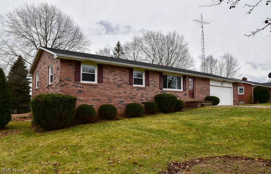 Remodeled 3 bedroom, 2 full bath brick ranch with a finished walkout lower level in a great Louisville neighborhood! Many updates including all new windows, hot water tank in 2017, roof in 2014, all new flooring, light fixtures and fresh paint throughout! Completely move-in ready! Beautifully redone kitchen offers brand new cabinets, countertops, sink and stainless steel appliances! It opens to the dinette with a sliding door to the spacious 3-seasons room. The master suite boasts a private full bath with new vanity, mirror and commode. The main full bath has been completely remodeled with all new tub and surround, vanity, mirror, lights and flooring. Entertain in the formal living room with a picture window or head downstairs for larger gatherings in the spacious 40x13 finished rec room! This home boasts 1,144 sq ft plus an 18x12 3 season room PLUS an extra 520 sq ft in the finished walkout lower level with plenty of storage! Ample off street parking with a turnaround driveway and ove