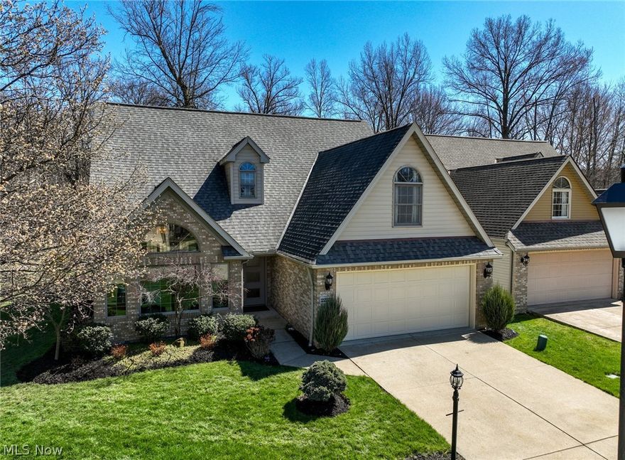 Welcome to this serene retreat nestled in a peaceful wooded cul-de-sac, offering unparalleled tranquility and privacy. This stunning freestanding cluster home boasts high-end features and luxurious amenities. Step inside to discover a luxurious sanctuary, featuring a first-floor master suite with a lavish glamour bath and an expansive two-story great room filled with natural light. The open kitchen is equipped with high-end Bosch appliances, Samsung French door refrigerator, and a heated floor from SunTouch, ensuring convenience and efficiency. Showers and bathrooms are adorned with Hansgrohe faucets, showerheads, jets, and Toto toilets, providing a spa-like experience. Natural maple engineered flooring on the first floor and hardwood natural maple floors on the second floor add elegance and warmth to the space. Outside, a charming patio with a unique pergola and beautiful landscaping offers the perfect setting to enjoy the outdoors. Membership to the master association, Meadowood, provides access to recreational amenities including a clubhouse, tennis and Pickleball courts, and an Olympic-sized swimming pool. With a low maintenance fee of $500 per year, this property offers endless opportunities for leisure and entertainment right at your doorstep. Don't miss out on this rare opportunity to own a remarkable property in a prime location. Schedule your viewing today and seize the chance to make it your own!