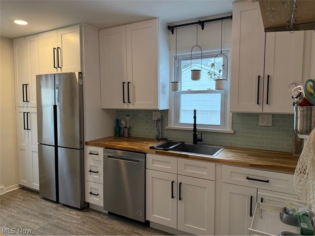 Photo of 11604 Bradwell Road, Garfield Heights, OH 44125 (MLS # 5192705)