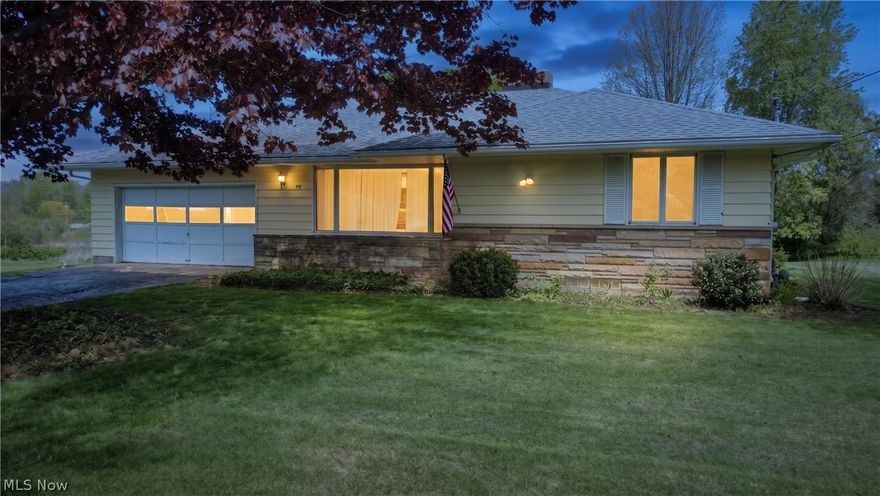 (VIRTUALLY STAGED/ENHANCED) Sitting on two parcels totaling .41 acres in a peaceful Geneva neighborhood, this ranch has the bones and the space to be something special. The open flow from the oversized living room into the dining room makes the main level feel larger than you'd expect — and with 3 bedrooms, 1.5 baths, and a well-sized kitchen, the layout works.

Downstairs is where this one really opens up. The full basement is massive — currently set up with a dedicated laundry area, workshop space, and a pool table zone, with plenty of room left over to make it whatever you need it to be.
Fresh paint throughout the bedrooms and brand new flooring across the main level (carpet's gone) mean the cosmetic work is already underway. Add your vision, and this becomes something.

Outside you've got a 2-car garage, a storage shed, and a yard that gives you actual space to breathe.
Location checks every box — minutes from Spire Academy, Geneva State Park, local dining, and under 15 minutes to Geneva-on-the-Lake.

Priced accordingly. Seller will make no repairs — selling as-is. Bring your vision and make it yours.