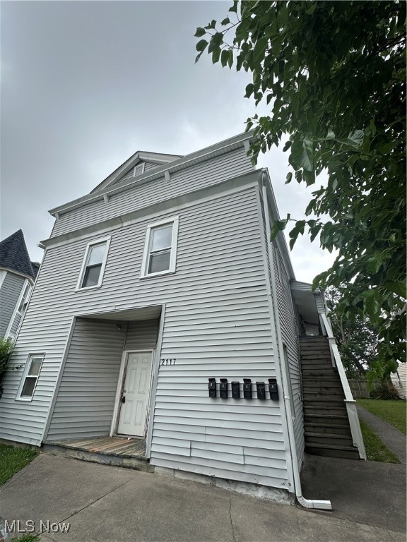 Property needs finished. This is an investor special. Cash/Hard money only. This is a 6 unit building in desirable area. All units are 2 bedrooms with potential for revised floorplan in front unit for 3 bedrooms. Unit layout is 3 down/3 up. Money has already been put into this property. 2 year old roof, new gutter on left, some chimney work done, some newer wiring, new gas lines for meters. New floor joists on main floor in all 3 units/down to studs. Upstairs units have had some prior work done to them and need finished w/some fixtures/cosmetics/mechanicals. Vinyl sided exterior. Parking area for potential tenants in driveway, off street and in rear. Do the math - you can get $900+/mo. on 2 bedroom units (finished) you could easily do the same here. Finish the property to your taste. Use front stairs only for upstairs access.