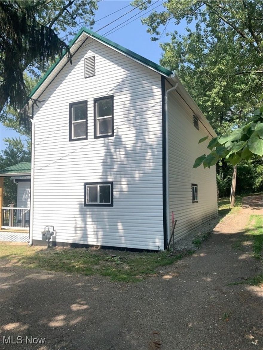 Completely remodeled inside and outside. New vinyl siding, new bathrooms, new plumbing, new flooring, new kitchen cabinets, new dry wall, new insulation, new furnace, new hot water tank, new a/c, new doors, new garage door, new windows, and new lighting. MOVE IN READY.
Additional available lot for sale.