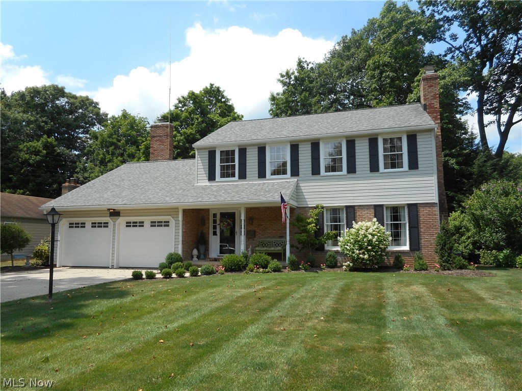 This fantastic property will "WOW" you when you pull in the driveway....this is the one you have been waiting for! Looking for quality? This home features an awesome layout, beautiful updates, 6 panel solid wood doors, and is well maintained with absolutely nothing to do. Hardwood floors throughout most of the home. Spacious living room with fireplace leads you to the formal dining room (both with crown molding). Updated eat-in kitchen offers plenty of cabinet space, quartz countertops, newer Samsung SS appliances & pantry. Sliders off the kitchen open to a fabulous screened-in porch with access to nice patio and awesome backyard overlooking Mud Brook. The inviting fireplaced family room offers an additional door to the screened-in porch. First floor powder room has been updated with quartz countertop, flooring & fixtures. The 2nd floor features 4 spacious bedrooms with nice closet space & a main full bath w/some updates. Relax & recharge in the spacious master bedroom with