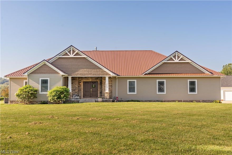 Welcome to your dream custom-built ranch house nestled on a picturesque corner lot, where luxury & comfort harmoniously coexist. This meticulously designed home boasts a perfect fusion of modern elegance & timeless charm offering everything you need. Step inside, and you'll be welcomed into a spacious and light-filled open-concept living space. The large living room is complete with a cozy fireplace & large windows with an abundance of natural light. You will love the olde wood hickory hardwood floors throughout the main floor. The gourmet kitchen is a culinary masterpiece, featuring granite countertops, stainless steel appliances, and an oversized island that doubles as a breakfast bar. The layout seamlessly connects the kitchen to the dining area, making it the perfect space for hosting gatherings. This ranch house offers three spacious bedrooms, each thoughtfully designed for ultimate comfort and relaxation. One of the bedrooms connects directly to the main hall bath & both have lar