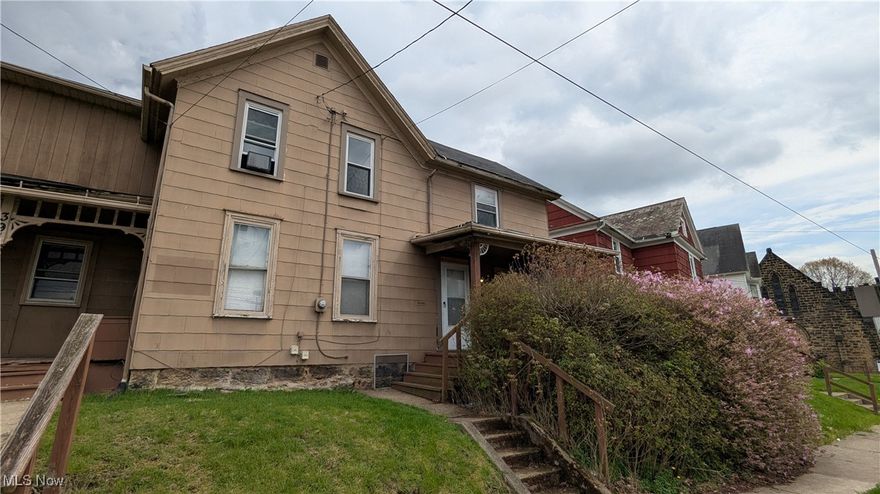 Investors!! Duplex in walking distance to the University of Akron. Fully occupied bringing in $1675 a month. Also available are the two neighboring properties. Perfect location to start a portfolio or add to your existing. Grap your favorite Realtor and schedule a tour today!