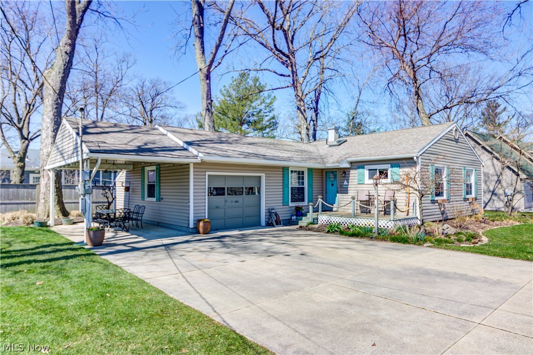 Lake life at its best! This well-maintained home is just steps from Lake Erie and features a welcoming interior, great outdoor space and access to Willow Grove, a private neighborhood beach. Step through the front door and enter into an adorable beach house with all the upgrades you are looking for. The living room is light and bright with updated vinyl flooring. The recently renovated kitchen has new appliances, backsplash, ceramic tile and professionally painted cabinets. You will love the spacious dining room that flows into the sun-filled four seasons room featuring a wall of windows with stunning LAKE VIEWS! The summery main bath has been updated and offers a skylight for even more sunlight. All bedrooms have newer flooring, paint and updated windows. A spacious laundry room with half bath round out the interior. The exterior has so much to offer and is great for entertaining! You can enjoy the fresh lake breeze from your front or back porch, or sit in the shade under your carport