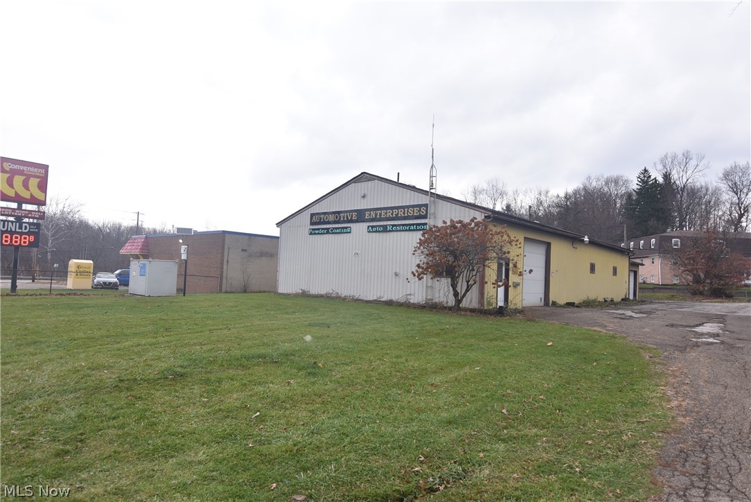 Warehouse/workshop available for sale with 3,560 square feet of space. There is a small enclosed office, one restroom, a large automotive paint booth, a main workshop space with a 12 foot overhead door, and a separate workshop space with a two car garage and 8 foot vertrical door. Sellers think it is 200 amp 3 phase electrical service - buyers must conduct due diligence for electrical output with licensed electrician. Great location for close access to SR 82/ Rte. 5 Outerbelt. Call to schedule your showing of this warehouse/workshop space today! There is a gasline easement on the property. Documents for the gas line can be accessed in the Trumbull County Recorder's website. This is an "AS IS" sale. Seller will not make further updates to the property. Gas easement onsite.