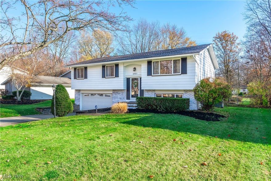 Welcome to this delightful bi-level home situated in the sought-after Bretton Ridge Community. The home features 3 generously sized bedrooms, one and a half bathrooms, and a 2-car garage with ample storage space. The main level boasts updated wood flooring in all the bedrooms, living room, kitchen, dining room and lower level, creating a warm and modern feel. The lower level offers a versatile living space, perfect for entertaining, a playroom, or a home office. The dining room opens to a spacious deck, ideal for outdoor relaxation, overlooking a park like fenced yard complete with a storage shed. Conveniently located near major highways and popular shopping centers, this home has seen several updates, including new flooring, fresh paint inside and out, updated light fixtures, doors, and a cozy breakfast nook. Don’t miss the chance to make this charming home yours!