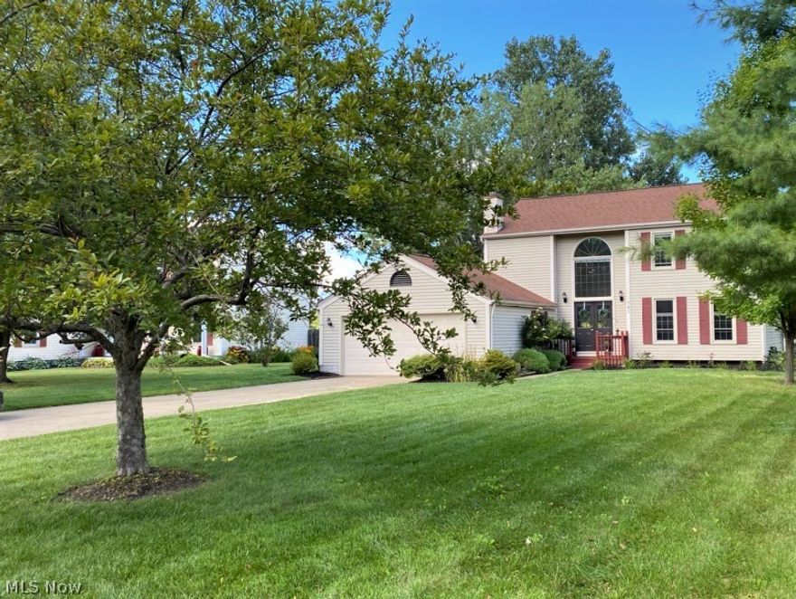 Welcome to your new home. This beautiful Colonial home is nestled in the sought-after Pines Development in Painesville Township. This home allows you access to The Pines development community pool, playground, and pavilion.  This home features a spacious  kitchen with high-end finishes, including granite counter tops, stainless steel appliances, and pass-throughs to the deck and family room. The beautiful bamboo floors spread throughout the entire first floor, empathizing the elegance of your home new home. It also features three huge bedrooms with plenty of closet space, two full bathrooms, one that is connected to the master bedroom, and one half bathroom on the main floor.  The finished basement allows for a great rec room, office, or workout center; the possibilities for this space are endless. Home Warranty is included. This home will not last so schedule a showing today.