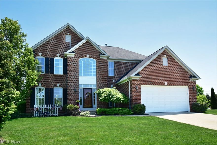 Welcome Home! This beautiful-very clean- well-maintained home sits on a premium corner lot. Home has upgraded stunning brick elevation with manicured landscaped yard.  Walk in to large airy 2 story foyer with waterfall staircase. Large- well lit- dining & living room space with beautiful built-ins. Open concept kitchen with oversized center island- many cabinets- all appliances. Kitchen is open to sun filled morning room with vaulted ceiling & beautiful windows. Enjoy your large deck off morning room – complete with hot tub. Large Family room off  kitchen has beautiful stack stone gas  fireplace. First floor laundry room  complete the first floor.  Large master bedroom includes spacious on suite bath & large walk in closet. Three other bedrooms & full bath complete second floor. Spacious basement is ready for you to finish & has additional laundry hook-up.