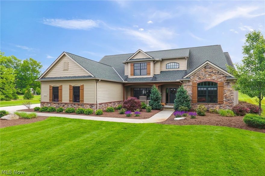 Sprawling Cape Cod home built by Petros Homes in 2013 on 2.2 acres.  This house is sure to impress with all the outstanding features that have been added through the years to make it the picture perfect house it is today.  Enter through the inviting front porch into a dramatic foyer and straight ahead is the two story Great Room with many windows, new carpeting, and an two way decorative Wood Bar.  The Designer Kitchen has glazed wood cabinets, granite counter tops and island, Stainless Steel Appliances and a Walk In Pantry flanked with a fantastic Serving Center Bar.  Formal Dining Room, Office, Sitting Room and First Floor Master Bedroom with en suite glamour Bathroom complete the first floor.  Upstairs you have an additional 3 Bedrooms, one en suite Bathroom and another Jack & Jill Bathroom.  The basement is massive and waiting for your finishing touches and is plumbed for an additional Bathroom.  The yard is picture perfect and manicured with a Stamped Concrete Patio complete with