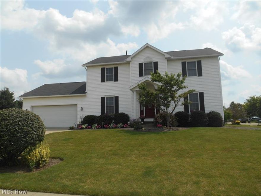 This lovely two story Colonial is in mint condition! This most popular floor plan has everything you are looking for! Really nice 14x25 great room with beautiful fireplace is perfect for family gatherings, terrific kitchen dinette with all appliances and a formal dining room that could easily be used as a den. Finished lower level offers an additional 485 square feet of living space. Gorgeous backyard features a wonderful outdoor living space with an awesome patio. The driveway has been expanded for additional parking as well.  Such a wonderful home nestled in a beautiful neighborhood!